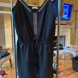 Elegant Black Dress with Embellished Neckline